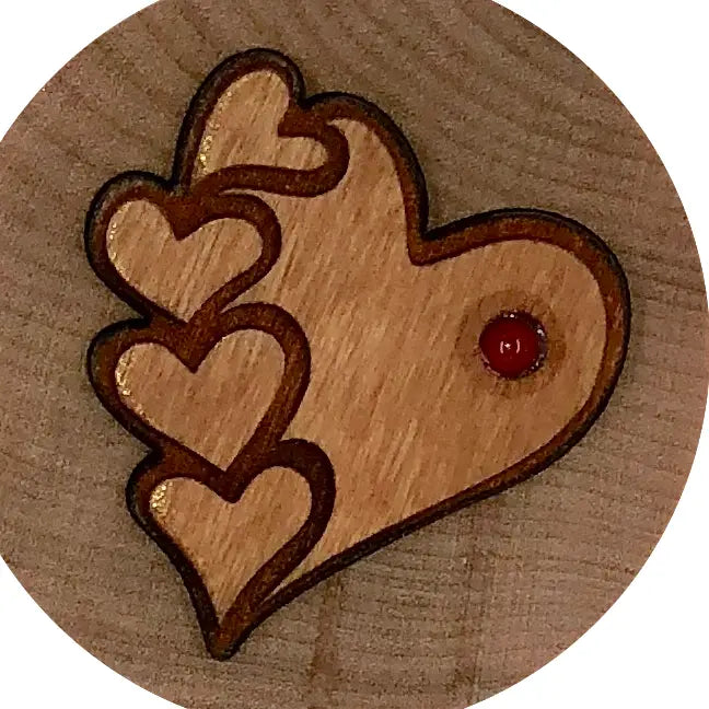 Five hearts applique on small maple box  w/paua shell.